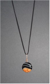 Copper wire wrapped Agate geode on black leather cord.